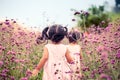 Child happy little girl running and having fun in the field Royalty Free Stock Photo