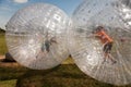 Child has a lot of fun in the Zorbing Ball Royalty Free Stock Photo