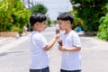 Child have enjoy for eating chocolate ice cream. Little boy eating an ice cream outdoors