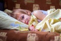 The child having chicken pox lies in a bed and has a rest Royalty Free Stock Photo