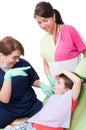 Child having fun with dental team in dentist office Royalty Free Stock Photo