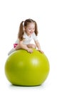 Child having fun with fit ball isolated Royalty Free Stock Photo