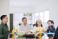 Child having lunch with her multi generation family Royalty Free Stock Photo