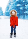 Child with heart in hands outdoors in winter Royalty Free Stock Photo