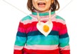 Child with heart shaped egg Royalty Free Stock Photo