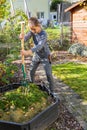 Child helping in the garden - composting Royalty Free Stock Photo