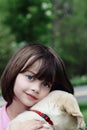 Child and Her Puppy Royalty Free Stock Photo