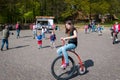 Child on a high wheel bicycle in the open air museum in Arnhem, the Netherlands Royalty Free Stock Photo