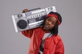 Child, hip hop and portrait with radio for rap music and dance in a studio with urban clothing. Fashion, African kid and Royalty Free Stock Photo
