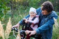 child and his father ride a bicycle using a child seat. The concept of family, and joint recreation.