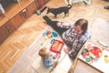 Child with his grandmother playing indoors Royalty Free Stock Photo