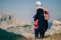 A child and his mother standing in in the wilderness Royalty Free Stock Photo