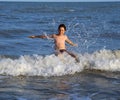 Child hit the water with a mighty splash Royalty Free Stock Photo