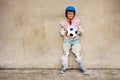 Child hold soccer ball overprotecting bubble wrap