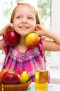 Child holding apples Royalty Free Stock Photo