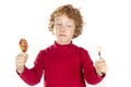 Child holding candy and fruit Royalty Free Stock Photo