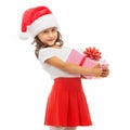 Child holding Christmas gift box in hand. Isolated Royalty Free Stock Photo