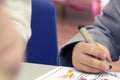 Child holding crayon to color Royalty Free Stock Photo