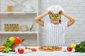 The child holding green bell peppers Royalty Free Stock Photo