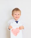 Child holding heart