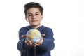 Child holding little globe planet