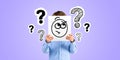 Child holding placard with pensive emoticon, question marks doodle Royalty Free Stock Photo