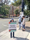 A child holding a poster asking to free Palestine