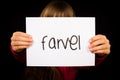 Child holding sign with Danish word Farvel - Bye Royalty Free Stock Photo