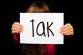 Child holding sign with Danish word Tak - Thank You Royalty Free Stock Photo