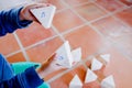 Child holding some wooden blocks with musical notes to learn music theory