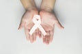 Child holding white ribbon. violence against children and women Royalty Free Stock Photo