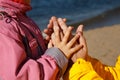 Child holds hand of adult. Royalty Free Stock Photo