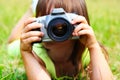 The child holds the photocamera Royalty Free Stock Photo