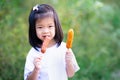 Child are hungry. Kid happily ate sausage skewers. Copy space