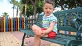 A child injured his foot while playing in the playground Royalty Free Stock Photo