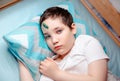 Child with an injury to forehead. Boy is upset about the head wound