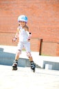 Child on inline rollerblade skates Royalty Free Stock Photo