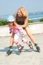 Child on inline rollerblade skates Royalty Free Stock Photo