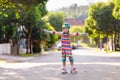 Child on inline skates. Kids skate roller blades Royalty Free Stock Photo