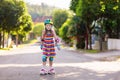 Child on inline skates. Kids skate roller blades Royalty Free Stock Photo