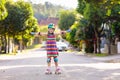 Child on inline skates. Kids skate roller blades Royalty Free Stock Photo