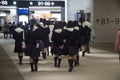 Child japanese student group walking in Airport go to gate for e