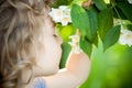 Child with jasmin flower