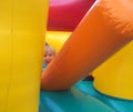 Child jumping in bouncy castle Royalty Free Stock Photo