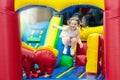 Child jumping on playground trampoline. Kids jump. Royalty Free Stock Photo