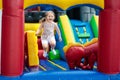 Child jumping on playground trampoline. Kids jump. Royalty Free Stock Photo