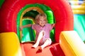 Child jumping on playground trampoline. Kids jump Royalty Free Stock Photo