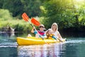 Child on kayak. Kids on canoe. Summer camping. Royalty Free Stock Photo