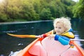 Child on kayak. Kids on canoe. Summer camping. Royalty Free Stock Photo