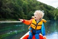 Child on kayak. Kids on canoe. Summer camping. Royalty Free Stock Photo